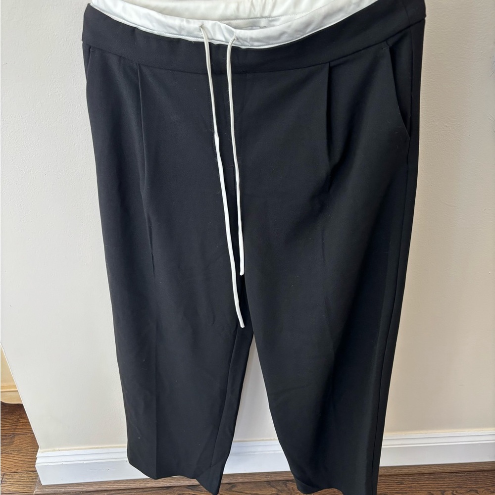 Belle Verde Drawstring Pants. Color is black. Woman’s size 6.